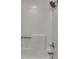 Bright white showerhead and tub, featuring new fixtures at 2919 Cushing Ct, Jonesboro, GA 30238