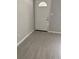 A look inside the room showcases a white door and hardwood flooring at 2919 Cushing Ct, Jonesboro, GA 30238