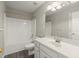Bathroom features a bathtub/shower combo, vanity with sink and modern lighting at 2880 Cressington Nw Bnd, Kennesaw, GA 30144