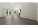 Bright, open living room with soaring ceilings, large windows and access to the outdoor space at 2880 Cressington Nw Bnd, Kennesaw, GA 30144