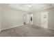 Spacious main bedroom includes ensuite bathroom and large closet space with neutral colors throughout at 2880 Cressington Nw Bnd, Kennesaw, GA 30144