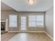 Bright dining area featuring access to the backyard and an adjacent stone fireplace at 51 Legend Creek Way, Douglasville, GA 30134