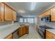 Updated kitchen featuring stainless steel appliances and ample counter space with open dining area at 51 Legend Creek Way, Douglasville, GA 30134