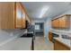 Modern kitchen with stainless steel appliances, sleek countertops and ample cabinet space at 51 Legend Creek Way, Douglasville, GA 30134
