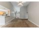 Spacious living room featuring high ceilings, neutral paint, and seamless flow into the kitchen at 51 Legend Creek Way, Douglasville, GA 30134