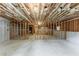 An unfinished basement featuring exposed ceiling and a concrete floor at 51 Legend Creek Way, Douglasville, GA 30134