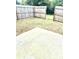 Fenced backyard with concrete patio for outdoor entertaining at 6318 Scudders Dr, Lithonia, GA 30058