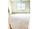 Carpeted bedroom bathed in natural light from a large window at 6318 Scudders Dr, Lithonia, GA 30058