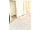 Bright bedroom with plush carpeting and a walk-in closet at 6318 Scudders Dr, Lithonia, GA 30058