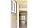 Inviting entryway with view into living area boasting hardwood floors and natural light at 6318 Scudders Dr, Lithonia, GA 30058