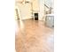 Open-concept living room with a fireplace, built-in shelving, and hardwood floors at 6318 Scudders Dr, Lithonia, GA 30058