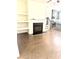 Cozy living room featuring fireplace, built-ins, hardwood floors and an open layout at 6318 Scudders Dr, Lithonia, GA 30058