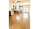 Stylish living space seamlessly connects the living room, kitchen, and dining area at 6318 Scudders Dr, Lithonia, GA 30058