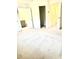 Spacious main bedroom with hallway, closet, and bathroom access at 6318 Scudders Dr, Lithonia, GA 30058