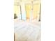 Spacious main bedroom with hallway, closet, and bathroom access at 6318 Scudders Dr, Lithonia, GA 30058