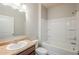 Bathroom featuring a sink, toilet, and shower with a bathtub at 1003 Eldon Ln, Fairburn, GA 30213