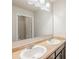 Bathroom featuring a double vanity, large mirror, and modern fixtures at 1003 Eldon Ln, Fairburn, GA 30213