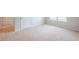 Bedroom featuring neutral walls, carpeted floors, and natural light from a window at 1003 Eldon Ln, Fairburn, GA 30213
