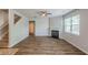 Spacious living room with hardwood floors and a fireplace at 1003 Eldon Ln, Fairburn, GA 30213