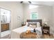 Bright bedroom with ensuite bathroom, light wood floors, and neutral decor at 2294 Hill Nw St, Atlanta, GA 30318