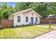 Inviting home exterior with a well-kept lawn and neat landscaping at 2294 Hill Nw St, Atlanta, GA 30318