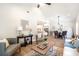 Open concept living area flowing into dining space and kitchen at 2294 Hill Nw St, Atlanta, GA 30318