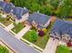 Beautiful brick home featuring a well-manicured lawn and colorful landscaping at 280 Lakestone Pkwy, Woodstock, GA 30188
