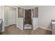 Bathroom showcasing a glass enclosed shower with tile surround and tiled floors at 280 Lakestone Pkwy, Woodstock, GA 30188
