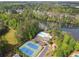 Community amenities include pool, tennis court, playground, and lush greenery with lake views at 280 Lakestone Pkwy, Woodstock, GA 30188