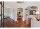 Elegant foyer with hardwood floors, soaring ceilings, and grand architectural details at 280 Lakestone Pkwy, Woodstock, GA 30188