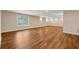 Spacious recreation room with hardwood floors and natural light at 280 Lakestone Pkwy, Woodstock, GA 30188