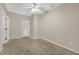 A bright bedroom featuring neutral walls and plush carpeting at 308 Holbrook Rd # Bldg 11, Smyrna, GA 30082