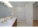 New bathroom boasts double sinks, a marble counter, gold faucets and a glass shower at 4328 Alison Jane Ne Dr, Kennesaw, GA 30144