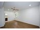 Large bedroom features hardwood floors, a ceiling fan, and a modern bathroom at 4328 Alison Jane Ne Dr, Kennesaw, GA 30144