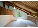 Bonus room with high ceilings, exposed wooden beams, and a staircase at 4328 Alison Jane Ne Dr, Kennesaw, GA 30144