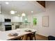 Modern kitchen with white cabinets, a center island, and stainless steel appliances at 4328 Alison Jane Ne Dr, Kennesaw, GA 30144