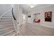 The front entry showing the staircase with a playroom visible at 1015 Bedford Gardens Dr, Alpharetta, GA 30022