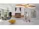 Modern kitchen with quartz countertops, stainless steel appliances, and stylish lighting fixtures at 1015 Bedford Gardens Dr, Alpharetta, GA 30022