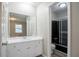 Bathroom with white vanity and shower/tub in the background at 2020 Buckingham Ct, Decatur, GA 30035