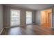 Bedroom features fresh paint, new floors, and 2 bright windows for ample light at 2020 Buckingham Ct, Decatur, GA 30035