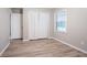 Bedroom has a large window and folding-door closet at 2020 Buckingham Ct, Decatur, GA 30035