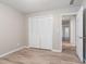 Bedroom with closet opens to hallway; new paint and floors at 2020 Buckingham Ct, Decatur, GA 30035