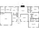 Detailed floor plan showcasing layout of rooms, including bedrooms, living spaces, and garage at 2020 Buckingham Ct, Decatur, GA 30035