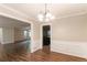 Open-concept dining area with views of the living room and kitchen, perfect for entertaining guests at 2814 Brackenwood Dr, Snellville, GA 30039