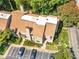 Charming townhome featuring a well-maintained exterior, private parking, and mature trees at 3500 Stonewall Pl, Atlanta, GA 30339