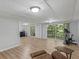 Bonus room with wood-look floors, a sliding door to a deck, and recessed lighting at 3500 Stonewall Pl, Atlanta, GA 30339