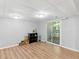 Bonus room with wood-look floors, a sliding door to a deck, and recessed lighting at 3500 Stonewall Pl, Atlanta, GA 30339