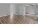 Spacious open-concept living room features stylish floors and ample space for entertaining at 3500 Stonewall Pl, Atlanta, GA 30339