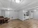 Living Room with laminate flooring and an easy chair at 3500 Stonewall Pl, Atlanta, GA 30339