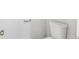 Close-up of a standard, white toilet with matching tank at 3500 Stonewall Pl, Atlanta, GA 30339